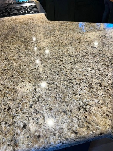 A shining countertop restored professionally by ServiceFirst Clean & Restore in Charleston, WV