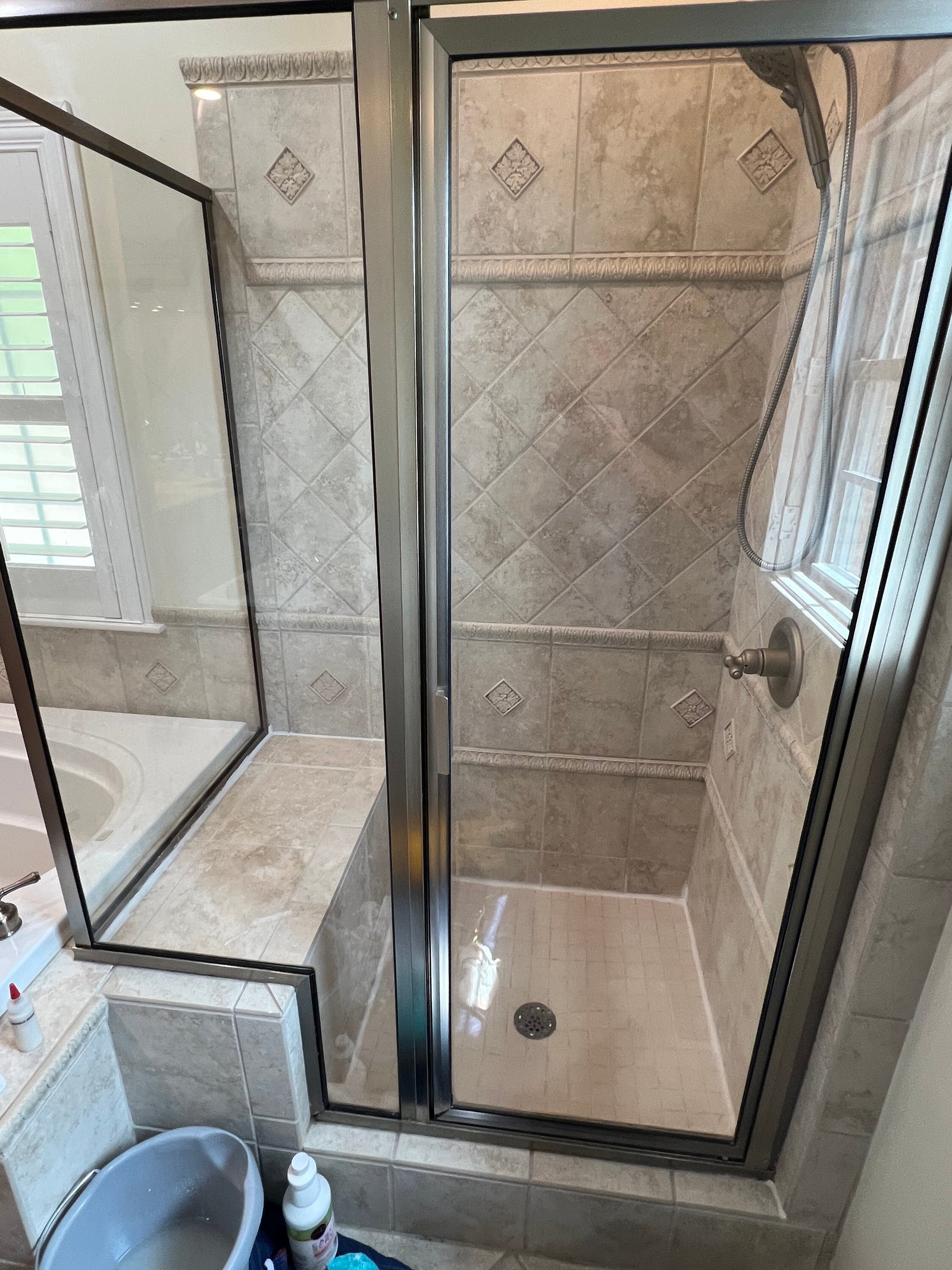 Travertine shower refinished and restored by ServiceFirst Clean & Restore in Charleston,WV