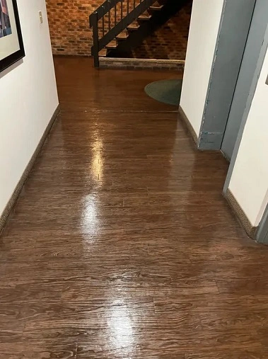 A shining wood floor restored professionally by ServiceFirst Clean & Restore in Charleston, WV