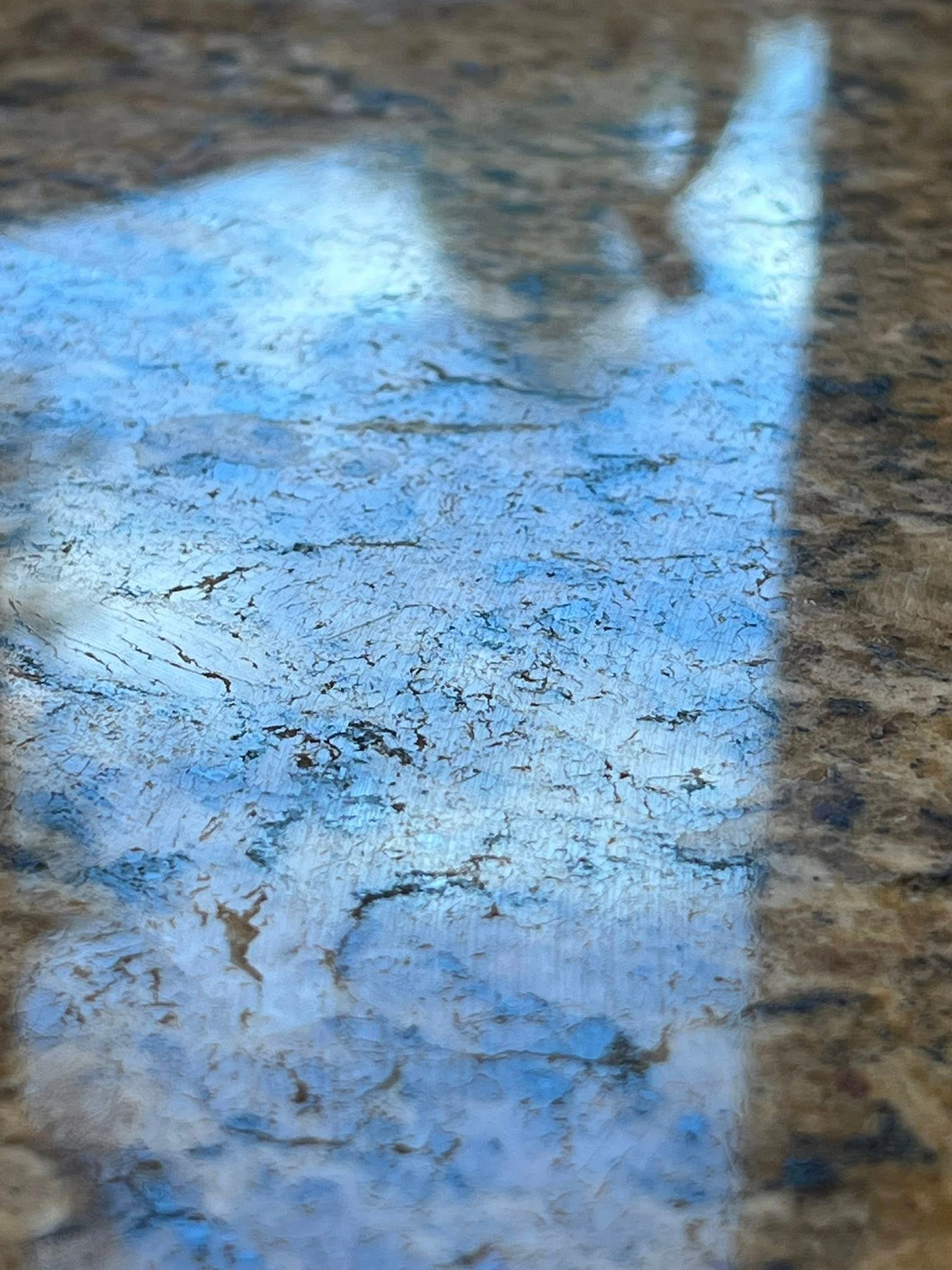 Volcano and lava field against a stormy sky