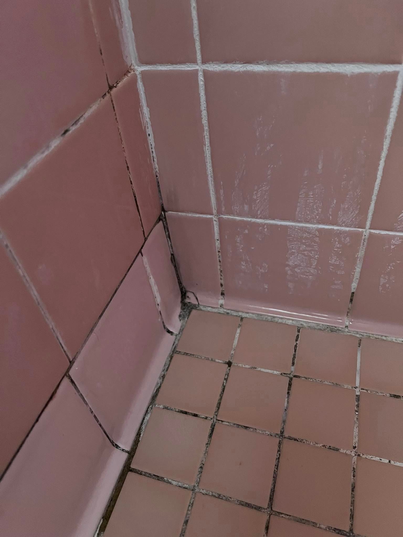 Volcano and lava field against a stormy sky