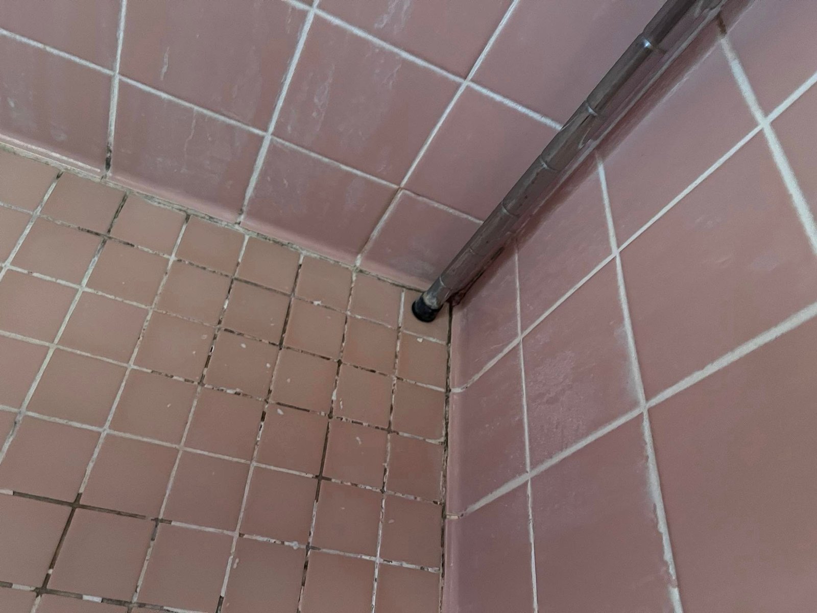 Volcano and lava field against a stormy sky