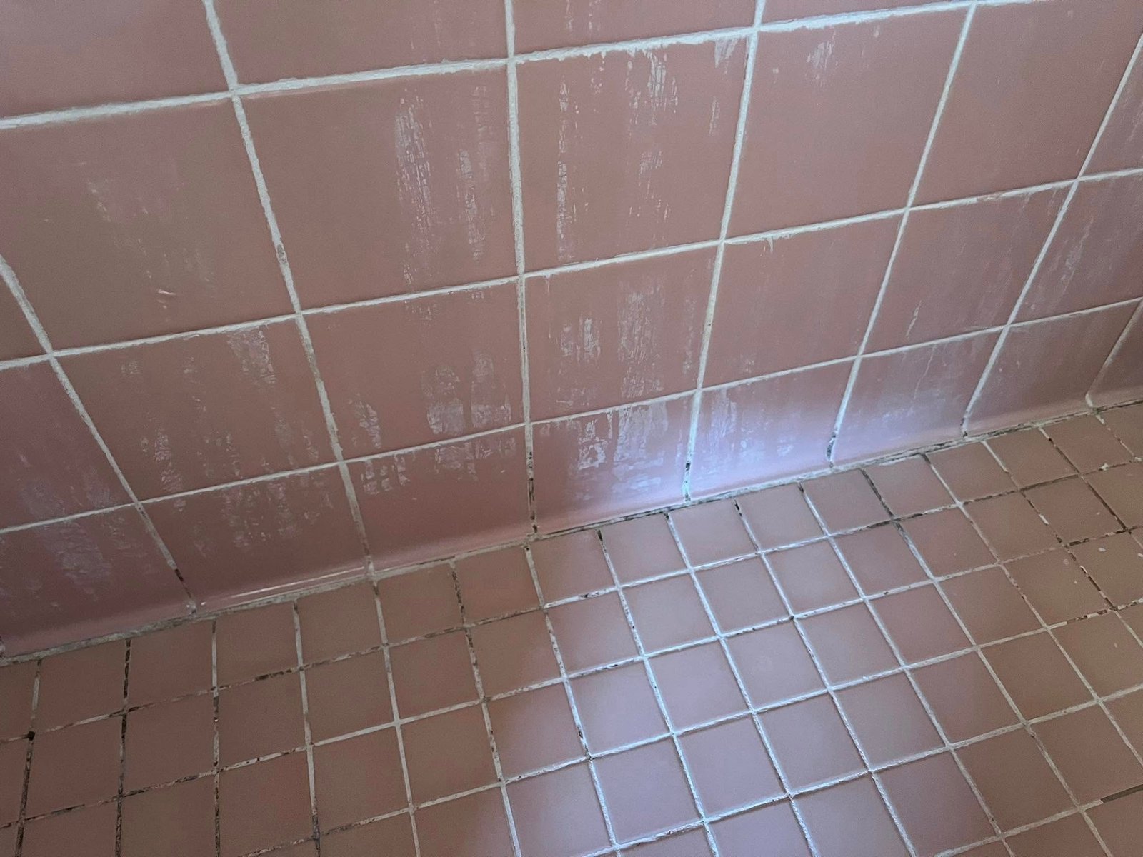 Volcano and lava field against a stormy sky