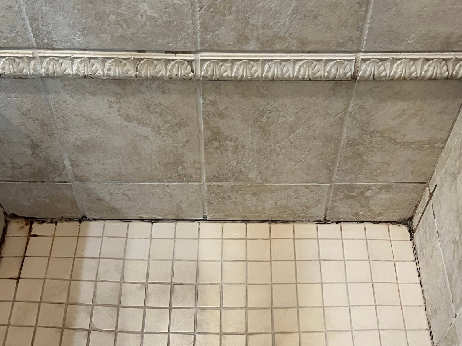 Volcano and lava field against a stormy sky