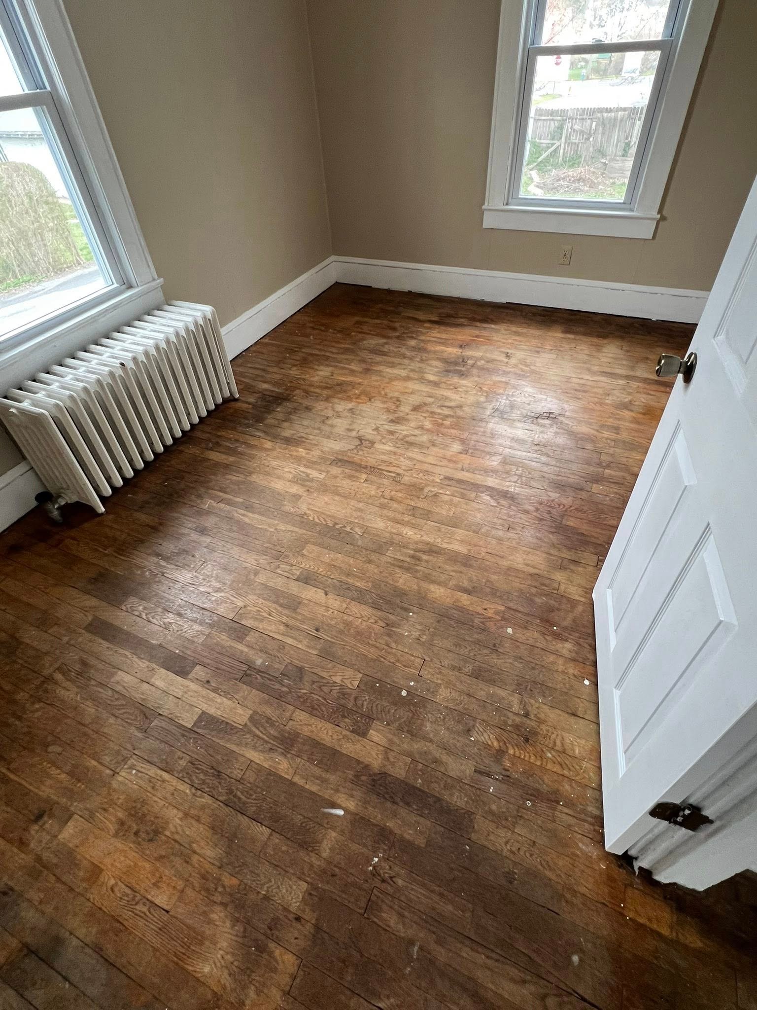 Volcano and lava field against a stormy sky